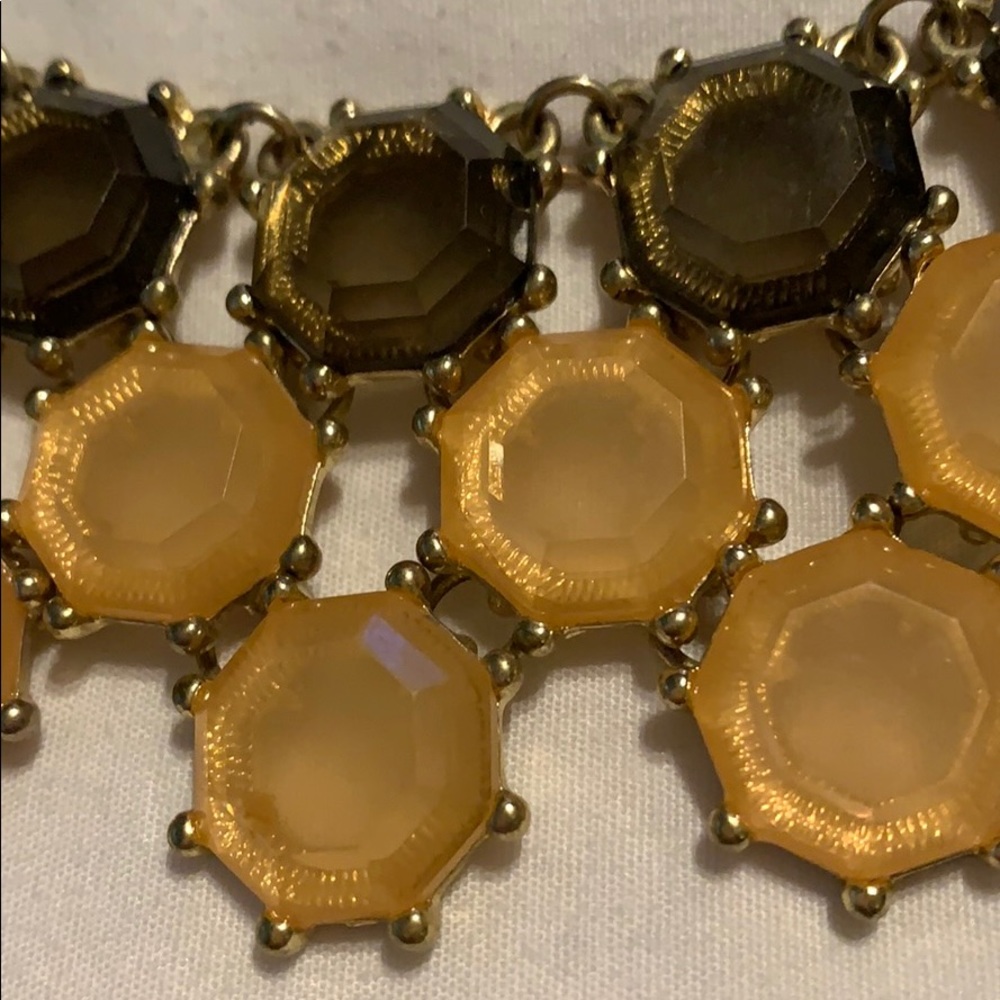 Peach gold colored necklace and earrings